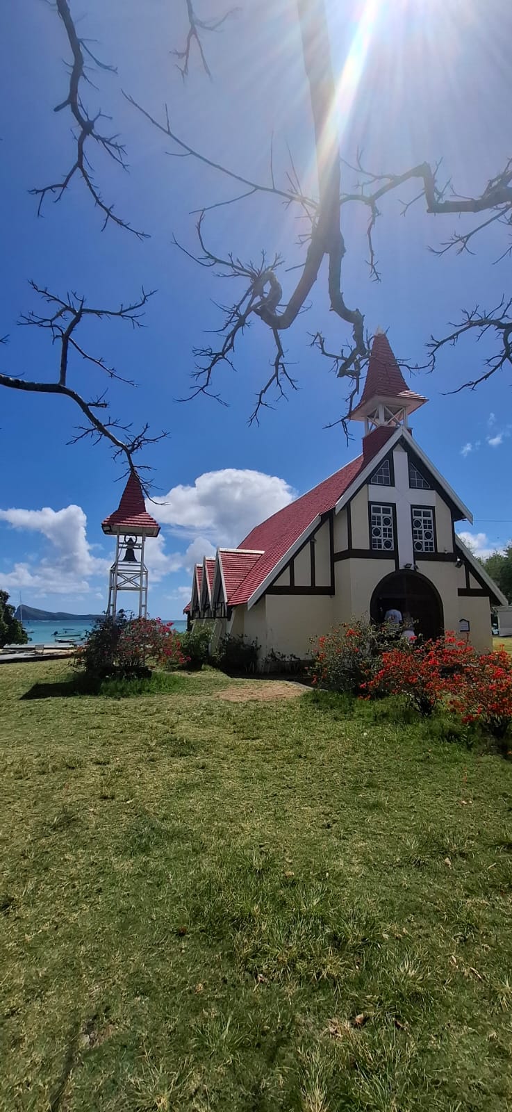 Red-roof church beside the lagoon at Cap Malheureux